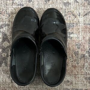 Dansko Women's Black Patent Clogs